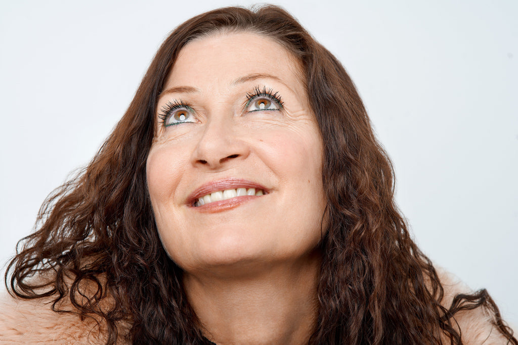 smiling woman looking up