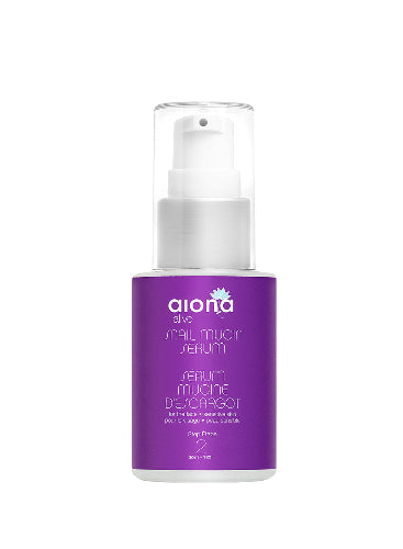 Purple serum bottle with white cap on a white background