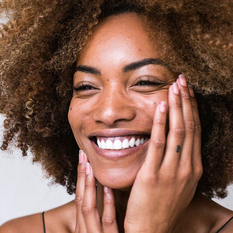 happy black woman for blemish 